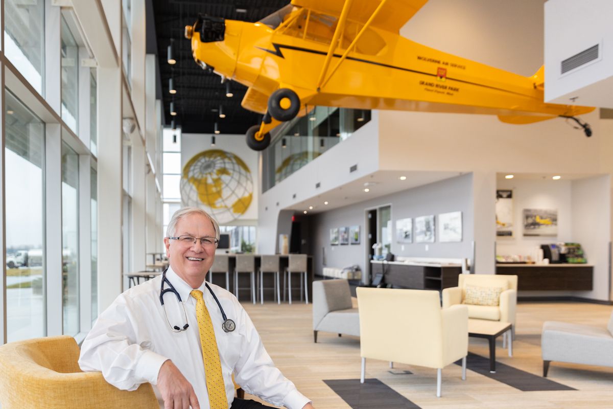 Dr. Steve Edmondson in the hangar lobby at Gerald R. Ford International Airport