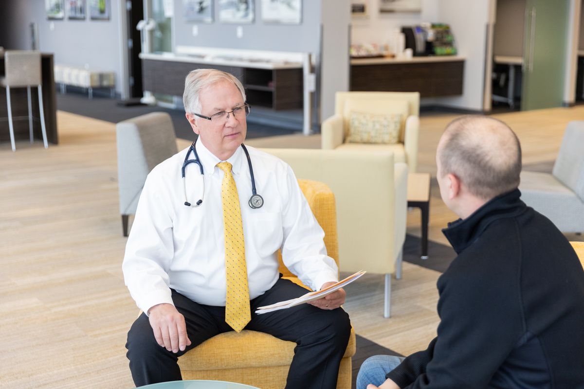 Dr. Edmondson reviewing a pilot\u2019s MedXPress application on screen