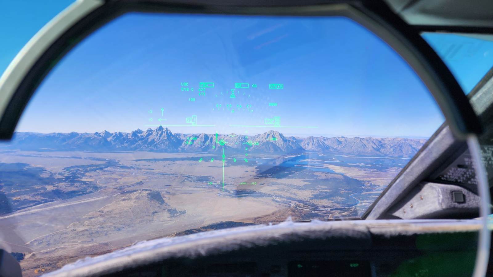 Mountain terrain on approach seen from the flight deck